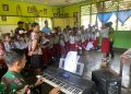 Tingkatkan Kualitas Pendidikan, Satgas Yonif 131/Brajasakti Mengajar di SDN YPPK Wembi Perbatasan Papua