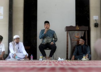 Erwin, Ajak Warga Lindungi Diri dengan Bersedekah