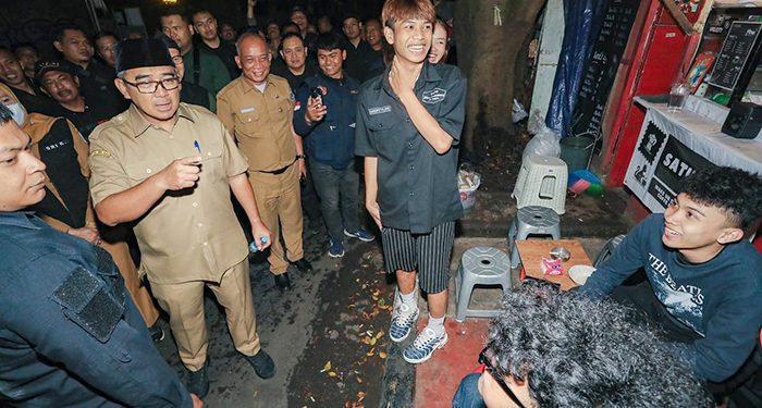 Milenial dan Gen Z Ikut Siskamling Warga Jaga Warga